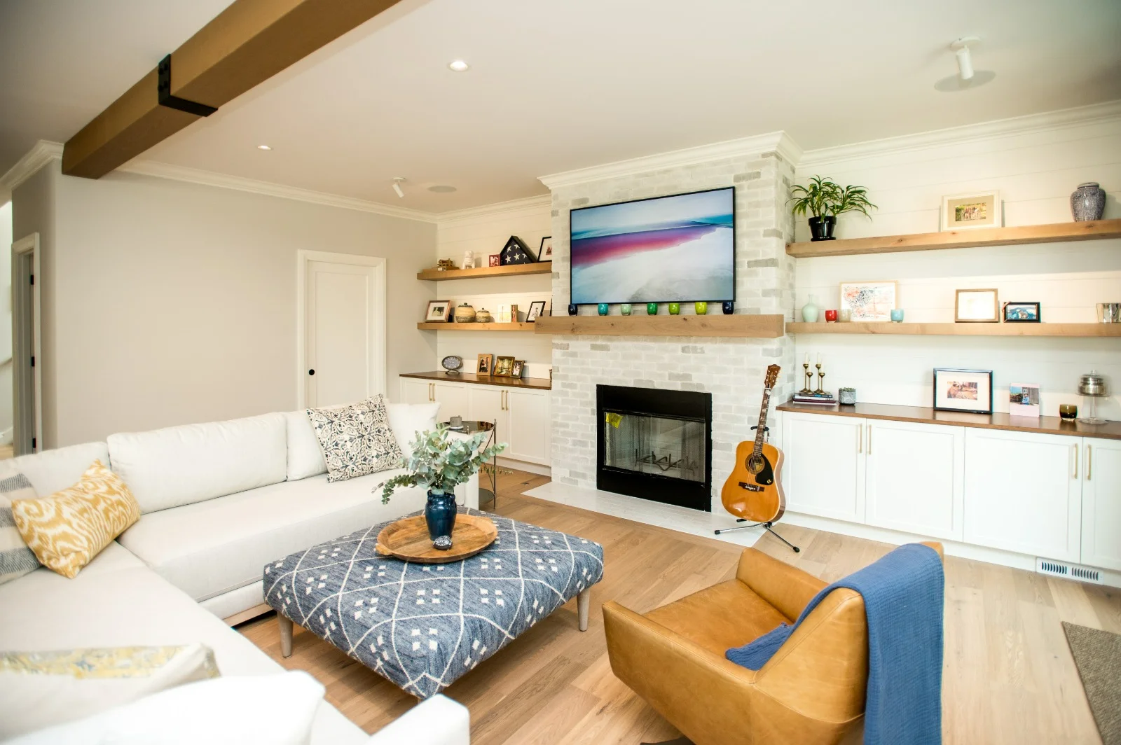 Family room · floating oak shelves