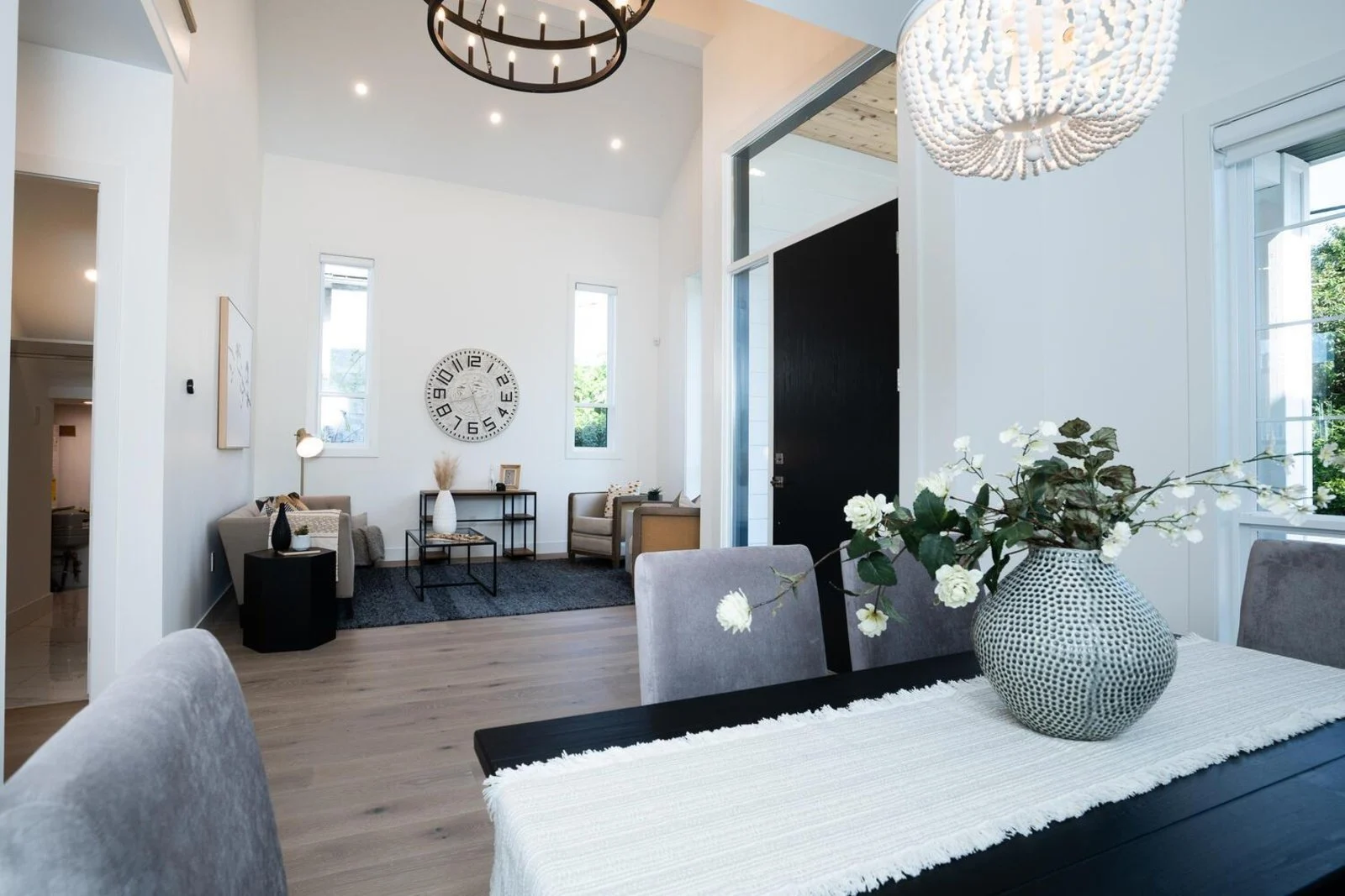 Dining open to sitting room, cross-axis sightline after wall removal